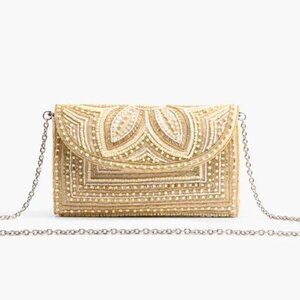 America and Beyond Whisper White Clutch